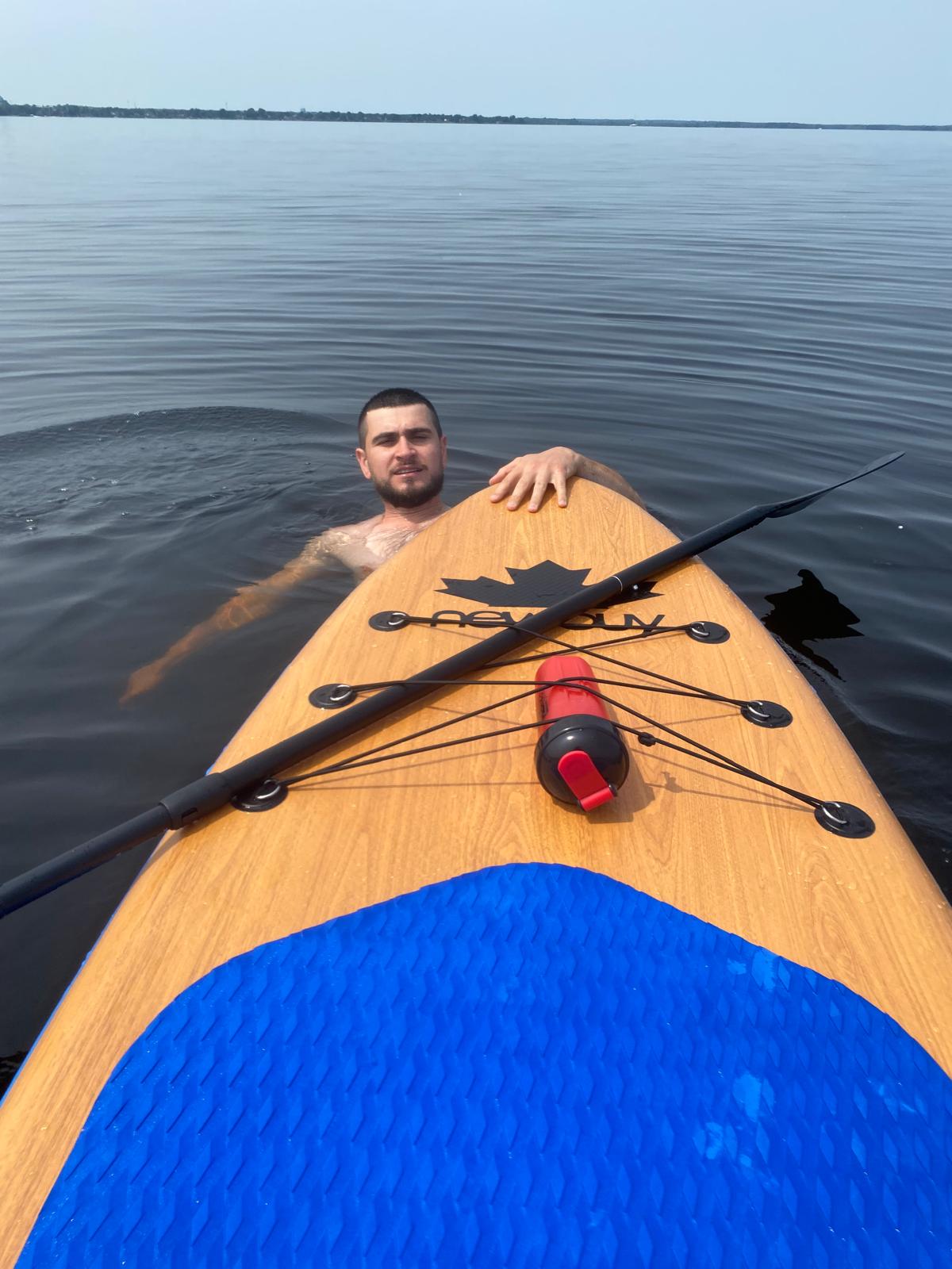 Paddle boarding on the water